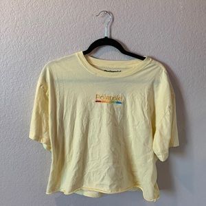 Yellow Polaroid crop tee. Size XL in kids.